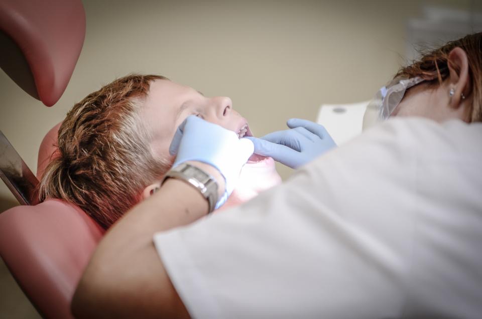 A dental professional at work